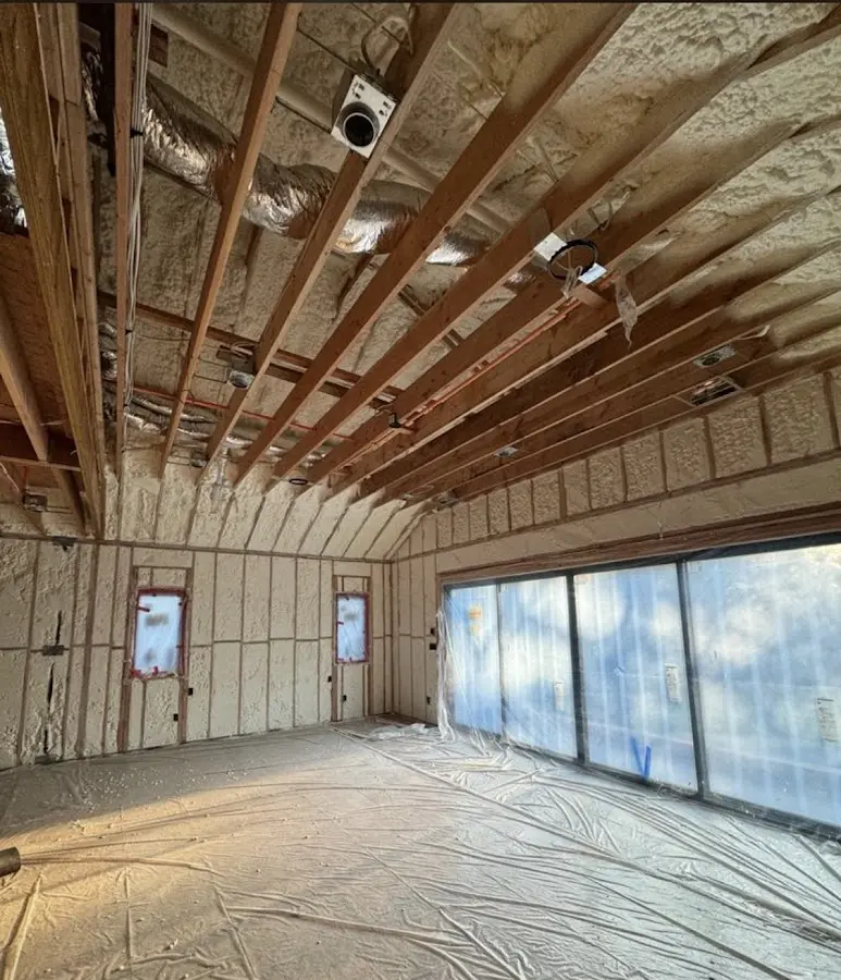 Interior walls and ceiling insulated with spray foam during new construction in Holbrook